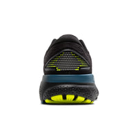 Black and blue athletic shoe with yellow accents on a white background