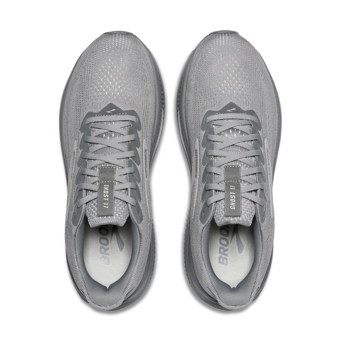 Pair of gray running shoes on a white background