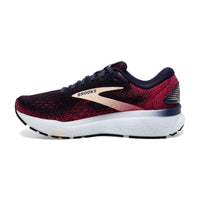 Black and red running shoe with Brooks logo on a white background