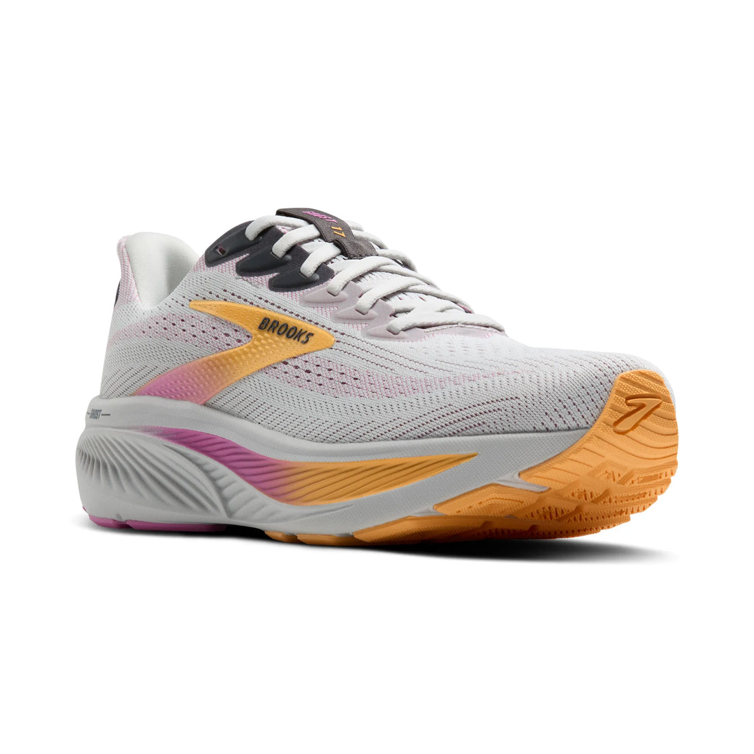 White running shoe with orange sole on a white background