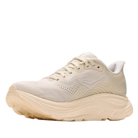 Beige running shoe on a white background