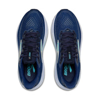 Pair of blue running shoes with white soles on a white background