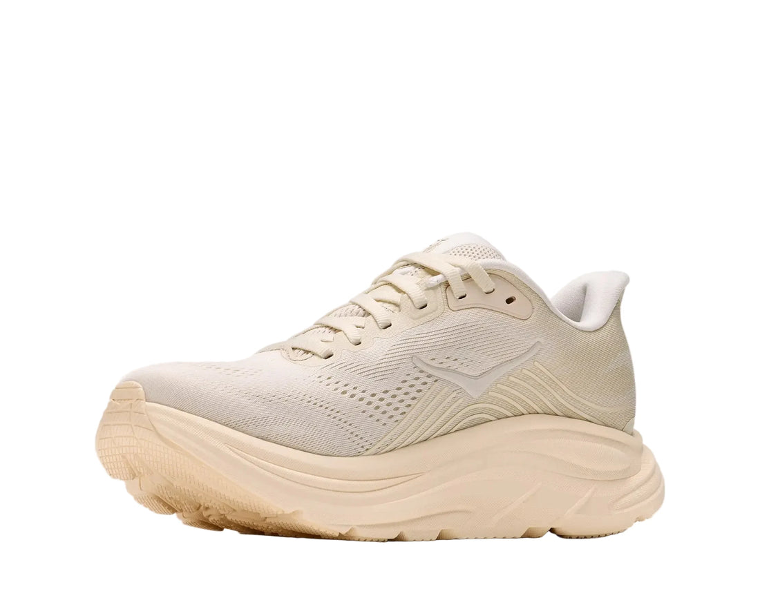 Beige running shoe on a white background