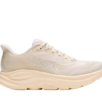 Beige running shoe with 'Hoka' branding on a white background
